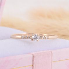 Small & dainty 14k yellow gold promise ring for her, Unique delicate minimalist womens promise ring, Small tiny gold cz engagement ring WE OFFER UNLIMITED PERIOD INSTALLMENTS PLAN This is a beautiful, stunning, feminine ring that works well for all occasions, styles, and ages. You will love it! Ring information: Main stone: White cubic zirconia Approximate size: 2.5mm Accent stones: Cubic zirconia Approximate size: 1.0mm (6 stones) Metal type: Gold Metal stamp: 14k Gold Installment Payments Minimalist Vvs Clarity Jewelry For Promise Ring, Minimalist Rose Gold Cubic Zirconia Diamond Ring, 14k Rose Gold Solitaire Jewelry For Promise, Minimalist Diamond Ring With Accents For Promise, Delicate Diamond Promise Ring, Delicate Round Cut Diamond Ring For Promise, Delicate Brilliant Cut Diamond Promise Ring, Delicate Cubic Zirconia Diamond Ring With Single Diamond, Delicate Rose Gold Stackable Cubic Zirconia Rings