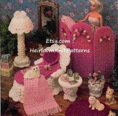 a crocheted doll house with furniture and accessories in pink, white and green