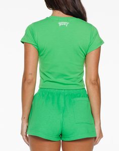 The Tour Baby Tee is a slim, super soft casual tee designed with style and athleisure in mind - Slim Crewneckline - Short sleeves - Tour Fabric Print - Slim fit - Designed for high movement activities, as well as leisure 93% Cotton. 7% Spandex Olivia wears a SmallShe is 160cm (5'3") tall with an 86cm (33") bust, a 67cm (25") waist and 88cm (32") hips. Casual Cropped Crew Neck T-shirt For Workout, Casual Stretch Crew Neck T-shirt, Trendy Stretch T-shirt For Streetwear, Sporty Stretch Cropped T-shirt With Graphic Print, Summer Athleisure T-shirt With Logo Print, Fitted Streetwear T-shirt With Screen Print, Athleisure Stretch T-shirt With Logo Print, Casual Summer Workout T-shirt, Casual Stretch T-shirt With Letter Print