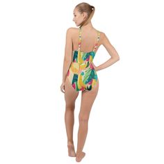 Elevate your swimwear collection with the Tropical Fruit Cocktail High Neck One Piece Swimsuit by Mila Beachwear. Perfect for those who love to combine playful prints with elegant design, this swimsuit features a vibrant tropical fruit print and a sophisticated high neck style, ensuring you make a chic statement at every beach or poolside event. Crafted from high-quality, quick-drying fabric, the Tropical Fruit Cocktail High Neck One Piece Swimsuit ensures both comfort and durability. The premium material hugs your body in all the right places, providing a sleek and flattering fit while allowing for ease of movement, whether you're swimming, lounging, or enjoying beach activities. Embrace the vibrant energy and sophisticated style of summer with the Tropical Fruit Cocktail High Neck One Pi Tropical Stretch Swimwear For Poolside, Fitted Swimwear With Palm Tree Print For Vacation, Multicolor Palm Tree Print Swimwear For Poolside, Hawaiian Tropical Print Swimwear For Pool, Fitted Palm Tree Print Swimwear For Beach Party, Beachwear Swimwear With Palm Tree Print For Pool, Tropical Tankini For Poolside, Tropical Stretch Swimwear For Vacation, Palm Tree Print Beachwear For Pool