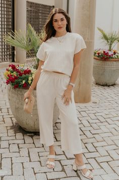 Full body view of female model wearing the Willow Cream Woven Cropped Pants which features Cream and White Woven Design, Cropped Wide Pant Legs, Two Pockets On Each Side and Elastic Waistband Visual Texture, Woven Design, Jumpsuit Shorts Rompers, Maxi Dresses Casual, Wide Pants, Dress Jewelry, Effortless Chic, Romper Pants, Spring Dresses