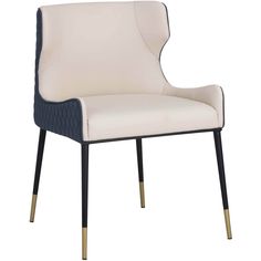 a white and black chair with gold legs