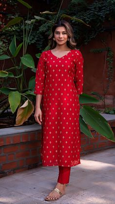 Bring on the festive spirit with our kurta set in hand embroidered chanderi silk. Fully lined kurta and pants. Made in chanderi silk. Dupatta in mul cotton with gold tikki details. Color of Kurta + Pants : Red. Color of Dupatta : Purple. Model height is 5.6” and is wearing a size S. Wash Care : Dry Clean Only. Festive Chanderi Sharara With Printed Motifs, Chanderi Sharara With Printed Motifs, Chanderi Straight Kurta Sharara With Printed Motifs, Festive Anarkali Kurta With Printed Motifs, Diwali Straight Kurta Palazzo Set With Gota Work, Diwali Palazzo Set With Gota Work On Straight Kurta, Navratri Palazzo Set With Straight Kurta And Gota Work, Mulmul Palazzo Set With Zari Work And Straight Kurta, Chanderi Kurta With Resham Embroidery For Diwali