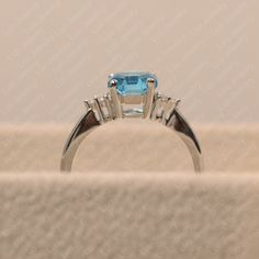 This ring features a 7*7 mm octagon cut swiss blue topaz. Customization is available. It is made by hand, and it will take about 7 days to finish the ring after your payment is completed. Main stone: 7*7 mm octagon cut swiss blue topaz Main stone weight: 1.77 ct Metal type: sterling silver /14k gold Accent stone: cz Customization is available, just fee free to contact me, it is free to engrave inside the ring, it is free, you can leave a ntoe with your order, but it will be great no more than 15 Swiss Blue Topaz Ring, Silver Anniversary, Swiss Blue Topaz, Gold Accent, Blue Topaz Ring, May 11, Topaz Ring, Anniversary Ring, Ring For Women