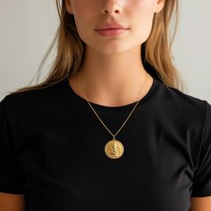 PENDANT INFORMATIONThis pendant is made of real, solid gold.• Made in USA• Material: 14k or 18k solid gold• Finish: polished• Height: 1.15" (29 mm) | *includes the small circle, bail dimensions not included• Width: 1" (26 mm)• Pendant weight: approx. 6 grams (14k)• Bail: fits up to 4 mm chains• Solid back, not hollow• A certificate of authenticity is included• Delivered in our elegant jewelry box, making it the perfect gift Shipping: All of our orders are custom-made. Please allow approximately Ganesh Pendant, Phoenix Pendant, Gold Dragon, Small Circle, Solid Gold Chains, Box Making, Tree Of Life Pendant, Dragon Pendant, Yellow Gold Pendants