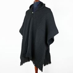 Llama Wool Unisex South American Handwoven Hooded Poncho - solid black pattern Black Alpaca Poncho For Winter, Casual Alpaca Poncho For Winter, Black Alpaca Cape For Winter, Casual Alpaca Poncho For Fall, Casual Wool Poncho, Casual Wool Poncho One Size, Casual One-size-fits-all Wool Poncho, Poncho Coat Cape, Hooded Poncho