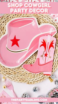 a pink cowboy hat with red stars on it and the words shop cowgirl party decor