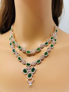 High quality Luxury Diamond, American Diamond Necklace with Emerald Green With Gold plating, Silver plating and Rose Gold plating. Lightweight and Elegant  Very beautiful party wear necklace set to put extra beauty in your look  Necklace length: 18 inches  Earrings length: 2.5 inches  Care instructions: Avoid Heat and Chemicals like perfume, Deo, Alcohol Etc| clean with Dry Cotton Cloth| Pack in An Air Tight Container After Use. *Disclaimer* ✨ product and color may slightly very due to photograp