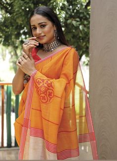 Product Features: Saree Color: Yellow Saree Fabric: Linen Blouse Color: Red Blouse Fabric: Linen Work: Digital Printed Wash Care: Dry Clean Occasion: Festivewear, Partywear, Casual Product Type: Saree Disclaimer: There will be slight difference in digital to actual image Red V-neck Saree For Festivals, Red Handloom Blouse For Puja, Orange Blouse Piece For Festive Occasions, Red Sets For Puja, Orange Cotton Saree With Pallu Detail, Yellow Blouse Piece With Self Design, Cotton Saree For Puja, Traditional Handloom Summer Blouse Piece, Red Bollywood Style Handloom Blouse