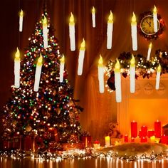 a christmas tree surrounded by candles and lights