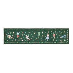 a green christmas ribbon with images of people, animals and other holiday decorations on it