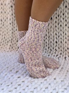 These hand knit wool socks for women are so comfortable you'll want to wear them all year long.  Our warm wool slippers provide a higher quality of craftsmanship, which means you can enjoy them year round, year after year.  Never again will you leave the comfort of your warm bed to be awoken by an ice cold floor beneath your feet. Cuddling up with a blanket in front of the television will no longer be a choice of warm feet or warm shoulders.  You'll no longer need a space heater beneath the desk Knit Wool Socks, Hand Knit Socks, Warm Bed, Socks Gift, Wool Slippers, Learn How To Knit, Handmade Gifts For Her, Never Again, Wool Socks