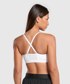 Gymshark Ruched Sports Bra - White | Gymshark Sporty Sports Bra With Strappy Back And Built-in Padding, Sports Bra With Built-in Padding For Light Exercise, Supportive Activewear With Built-in Bra For Light Sports, Athletic Fit Sports Bra With Built-in Bra For Training, Supportive Gym Bra With Built-in Support, Supportive Sports Bra With Built-in Bra For Light Sports, Functional Sports Bra With Built-in Bra For Gym, Supportive Sports Bra With Built-in Padding For Light Sports, Functional Gym Bra With Built-in Padding