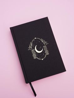 This journal is more than just a planner--it's a tool designed to help you cultivate mindfulness, build positive habits, and nurture your personal growth. By following the lunar cycles, you'll learn to align with the natural ebb and flow of energy. Whether you're new to journaling or a seasoned writer, this planner is here to inspire and support you on every step of your journey. The Moon has been a source of inspiration, mystery, and guidance for centuries, and now it's your turn to harness its Lunar Planner, Moon Date, Moon Journal, Holiday Offer, Ebb And Flow, Lunar Cycle, Work Planner, Positive Habits, Time Design