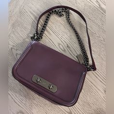 Barely Worn Coach Bag With Tags Still. Classic Rectangular Bag With Branded Hardware, Classic Rectangular Bags With Branded Hardware, Everyday Tote Flap Bag With Branded Hardware, Elegant Purple Rectangular Shoulder Bag, Purple Leather Rectangular Bag, Elegant Everyday Flap Bag With Silver-tone Hardware, Purple Clutch Bag For Everyday Use, Elegant Purple Satchel Shoulder Bag, Elegant Shopping Box Bag With Palladium Hardware