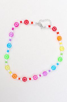 Rainbow smiley necklace with adjustable length Cheap Adjustable Rainbow Jewelry, Cheap Rainbow Beaded Necklaces With Letter Beads, Cheap Rainbow Necklace With Large Beads, Trendy Adjustable Round Choker, Adjustable Round Trendy Choker, Casual Necklaces With Adjustable Chain For Everyday, Casual Adjustable Chain Jewelry For Friendship, Casual Handmade Round Necklace, Fun Adjustable Everyday Necklace