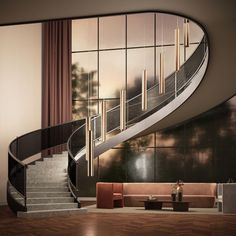 an elegant staircase in the middle of a living room