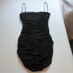 Size Large. In Excellent Condition No Flaws. Bust: 16” Waist: 12” Length: 34” Approx Black Mini Dress With Ruched Bodice, Bodycon Sleeveless Mini Dress With Ruched Back, Sleeveless Bodycon Dress With Ruched Sides, Sleeveless Mini Dress With Ruched Back For Cocktail, Sleeveless Ruched Bodice Bodycon Mini Dress, Sleeveless Cocktail Mini Dress With Ruched Back, Sleeveless Bodycon Dress With Ruched Sides For Evening, Stretch Sleeveless Dress With Spaghetti Straps And Ruched Detail, Sleeveless Ruched Mini Dress For Evening