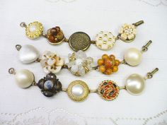 These gorgeous bracelets are fashioned from 'repurposed' vintage earrings. The earrings range from crystal clear rhinestones, faux pearls, ivory, crystals, Aurora Borealis, varying colors per set - gold accents, silver accents -- all on silver tone and gold tone . Great bracelet for that special occasion, bride or bridesmaid. Wedding APPEAL! AMAZING sparkle for the BRIDE or bridesmaid! They sit on a bracelet that is aprox. 7.25 inches long and is matte silver tone - nickel free and oxidized. I u Handmade Vintage Wedding Bracelets, Vintage Handmade Wedding Bracelets, Vintage Wedding Bracelet Jewelry, Vintage Jewelry Bead Caps For Jewelry Making, Vintage Metal Bracelets For Weddings, Vintage Gold Jewelry With Bead Caps, Vintage Beaded Bracelets For Formal Occasions, Vintage Adjustable Jewelry For Wedding, Vintage Beaded Wedding Bracelets