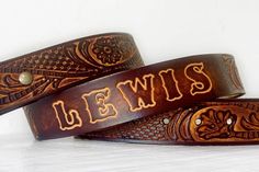 Engraved Leather Belt - Personalized Father's Day Gift with Name - A great gift for him or her! Western style personalized leather belt with custom name - up to 7 characters. Perfect for Father's Day, Anniversary, Groomsmens gifts and all occasions. Genuine Leather belt, Tooled, hand dyed, personalized with your name.AVAILABLE CHARACTERS:English alphabet : A B C D E F G H I J K L M N O P Q R S T U V W X Y ZNumbers are NOT available to be embossed onto belts.MAXIMUM OF 7 LETTERS. (spaces do not c Tooled Belt, Leather Tool Belt, Custom Leather Belts, Mens Western, Tooled Leather Belts, Handmade Leather Belt, Cowboy Belt, Personalized Fathers Day Gifts, Wide Leather Belt