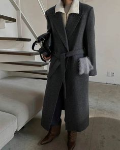 Polished, oversized structured overcoat in a classic wool alpaca fabrication. - Oversize cut- Notched lapel- Padded shoulders- Tie waist- Front flap pockets- Buttoned cuffs- Fully lined- Back vent- Measurements: Length 47.5", Bust 44", Shoulder 17.5" Sleeve 31"- Outer: Shetland Wool 80%, Baby Alpaca 10%, Nylon 10%- Dry clean- Imported Shetland Wool, Baby Alpaca, Flap Pocket, Alpaca, Dry Clean, Wool