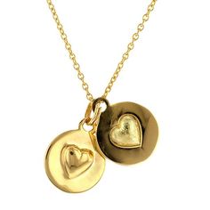 Designed as a sphere which can be split in half to reveal a convex heart on one half and a concave heart on the other side that fit together to complete the whole. Designed to be shared with your favorite person. Available in 18k yellow gold or Sterling Silver with two coordinating silver chains. Yellow Gold Double Heart Jewelry With Polished Finish, Heart-shaped Yellow Gold Necklace With Detachable Pendant, Engraved Double Heart Yellow Gold Necklace, Gold Round Engraved Heart Necklace, Gold Engraved Round Heart Necklace, Yellow Gold Polished Necklace For Anniversary Gift, Polished Yellow Gold Necklace For Anniversary Gift, Yellow Gold Necklace With Polished Finish For Anniversary Gift, Yellow Gold Necklace With Polished Finish For Anniversary