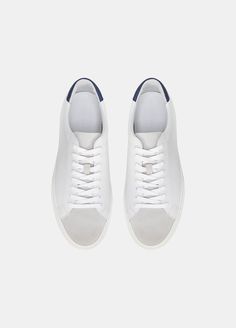 A minimalist sneaker in smooth leather with sport suede accents and lace-up styling. Timeless Sneakers, Korean Fashion Street Casual, Minimalist Sneakers, Lingerie Shop, Korean Street Fashion, Up Styles, White Sneaker, Smooth Leather, Baby Shoes