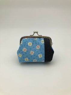 This Handmade Kiss Lock Coin Purse is made from High Quality Japanese Cotton Fabric. It is great for storing your coins, keys, headphone or little accessories when you go out. Therefore, this is an awesome gift for your Friends and Family Members. Material: - A nickel sew-on purse frame (8.5cm) - Outer: High Quality cotton fabric - Inner: Cotton fabric Size: 10cm x 7cm (including the frame) Remarks: 1) No glue is used. 2) The product is made in a smoke free and pet free home 3) The fabric placem Patched Denim, Clasp Purse, Denim Patches, Floral Denim, Denim Gift, Japanese Cotton, Lucky Cat, Coin Purses, Purse Pouch