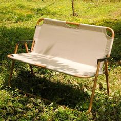 a chair that is sitting in the grass