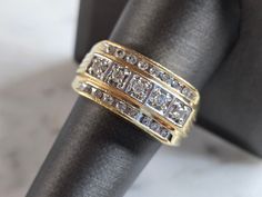 A MENS VINTAGE ESTATE 14K YELLOW GOLD DIAMOND RING.  THE TOTAL WEIGHT IS 8.5g, AND IS A SIZE 9.25.   THE WIDTH OF THE RING MEASURES 7/16".   THERE ARE ABOUT 0.42cts OF DIAMONDS.  RING IS MARKED 14K ON THE INSIDE OF THE BAND.   ANY QUESTIONS PLEASE DONT HESITATE TO ASK.  BE SURE TO CHECK OUT SOME OF OUR OTHER GREAT ITEMS UP FOR SALE.  THANK YOU. Yellow Gold Diamond Ring, Diamonds Ring, Gold Diamond Ring, Mens Vintage, Gold Diamond Rings, New People, Vintage Men, Favorite Jewelry, Gold Diamond