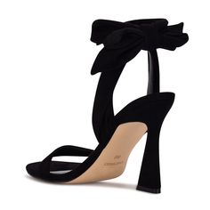 Step up your shoe game with the Nine West Kelsie dress sandal. This eye-catching style features a trendy sculpted high heel and soft textured fabric wraps around the ankle. Trendy yet chic the Kelsie sandal will elevate any outfit. Hoco Shoes, Homecoming Heels, Ankle Wrap Heels, Wrap Heels, Bridesmaid Shoes, Open Toed Heels, Shoe Inspo, Ankle Wrap, Open Toe Shoes