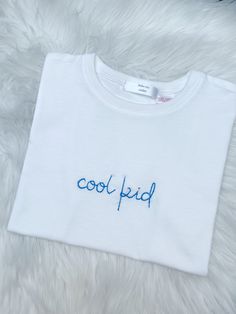 Personalized white tee for kids Since 12-18 months to 14 years old. After this age we have got the same product for adult Cotton T-shirt With Letter Embroidery For Birthday, White T-shirt With Letter Embroidery As Gift, Trendy White T-shirt With Custom Embroidery, Trendy White Tops With Letter Embroidery, Birthday Crew Neck T-shirt With Embroidered Text, Birthday Embroidered Text T-shirt With Crew Neck, White T-shirt With Letter Embroidery For Gift, Fun Embroidered Cotton T-shirt, Trendy White Embroidered T-shirt