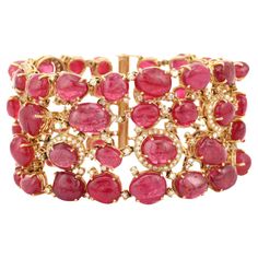 This Statement Ruby Diamond Bracelet in 18K gold showcases 58 endlessly sparkling natural ruby, weighing 207.68 carats and 144 pieces of diamonds weighing 7.72 carats. It measures 7.5 inches long in length. Ruby gemstone improves mental strength. Designed with perfect oval cut rubies, some of which covering with the diamonds around and some without the diamonds to make you stand out on any occasion or event. The elegant style complements the attire beautifully and this is a perfect july birthsto Precious Stones Bracelet, Eternity Bracelet, Crystal Phone Case, Black Diamond Bracelet, Ruby Bracelet, Modern Bracelets, Mental Strength, Bracelets Gold Diamond, Italian Jewelry