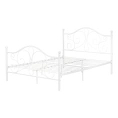 a white metal bed frame with scroll designs