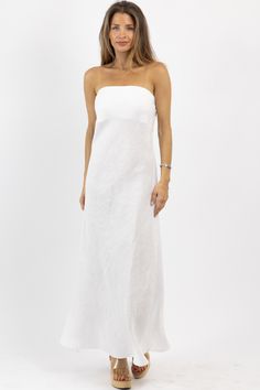 *SIGN UP FOR RESTOCK NOTIFICATIONS, ITEMS ARE RESTOCKED WHEN POSSIBLE BASED ON DEMAND* DESCRIPTION 100% Linen Strapless, Maxi length, Zippered closure, Lined, Fitted top with flow bottom Naomie is wearing a size small Height | 5'8 Dress size | 2 Please note: All items purchased on sale are final sale. We recommend checking your cart for sale items to make note of non-returnable items Chic White A-line Linen Dress, White Midi Dress With Straight Neckline For Beach, White Maxi Dress With Straight Neckline For Vacation, Chic White Maxi Linen Dress, White Linen Maxi Dress For Brunch, White Linen A-line Mini Dress, Chic White Linen Maxi Dress, White Linen Dress With Straight Neckline For Summer, White Summer Midi Dress With Straight Neckline