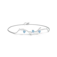 The sleek and elegant design of this tree branch bracelet instantly catches the eye. It also features aquamarines that radiate an icy blue brilliance. Designed in  platinum, this piece of jewelry is perfect for someone who has a refined sense of style. Branch Bracelet, Tanzanite Bracelet, Aquamarine Bracelet, Blue Topaz Bracelet, Blue Topaz Stone, Icy Blue, Aqua Marine, Swiss Blue Topaz, Tree Branch