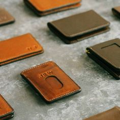 Our handmade men’s money clip is the perfect solution for those who want a simple wallet that isn’t too bulky, but is robust enough to hold everything you need— cash included. Featuring two front pockets with integrated thumb slot, a hidden rear pocket for those “always need but rarely use” insurance cards and the like, and the strongest magnets we were able to fit into a wallet of this size. Handcrafted to complement a guy of any age. Premium Horween full-grain leather and robust stitching for Trifold Card Holder With Rfid Blocking For Everyday, Rfid Blocking Trifold Card Holder For Everyday Use, Everyday Rectangular Wallet With Rfid Blocking, Everyday Trifold Rfid Blocking Card Holder, Classic Wallet With Id Window For Everyday Use, Trifold Wallet With Id Window For Everyday Use, Modern Trifold Wallet With Coin Pocket For Everyday, Modern Trifold Wallet With Coin Pocket For Everyday Carry, Modern Trifold Wallet With Rfid Blocking For Everyday