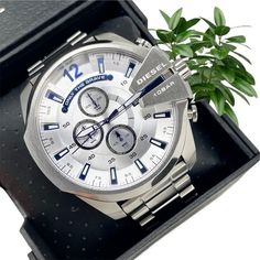 ***100% Guaranteed Authentic Or Your Money Back!*** ~Brand New~ Sku: Dz4477 Case Size: 59mm Movement: Quartz Platform: Mega Chief Strap Material: Stainless Steel Strap Color: Silver Case Water Resistance: 10 Atm Case Material: Stainless Steel Case Color: Silver Dial Color: Silver Strap Width: 26mm Closure: Bracelet Deployant Strap Inner Circumference: 200+/- 5mm Battery Type: Sr920sw Diesel Original Box And Authenticity Manual Included. Casual Chronograph Watch As Gift, Casual Chronograph Watch With Subdials, Casual Silver Chronograph Watch With Round Dial, Casual Silver Chronograph Watch, Casual Chronograph Watch With Subdials For Business, Casual Watch Accessories With Tachymeter And Round Dial, Casual Analog Chronograph Watch For Business, Casual Chronograph Watch With Tachymeter, Diesel Accessories