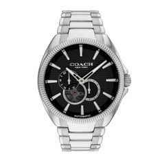 Combining discerning style with rugged functionality, the men's Jackson chronograph watch from Coach is made for life on the move. Black textured dial with two chronograph sub-dials, an open-work window showcasing the mechanical movement, luminous silver-toned hands and markers 44.15mm stainless steel case with mineral crystal and a coin-edge bezel Japanese quartz movement Stainless steel link bracelet; deployment clasp Water-resistant to 30 meters We are an authorized Coach dealer Black Skeleton, Mechanical Movement, Black Textures, Black Watch, Minerals Crystals, Chronograph Watch, Quartz Movement, Stainless Steel Case, Link Bracelets