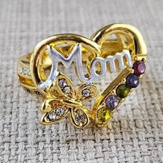 Mom Women Ring Gold Tone Crystals Fashion Jewelry To Mom With Love Ring Size 6 Unbranded Color: Gold Size: 6 Brand New. Adjustable Gold Heart Ring For Mother's Day, Gold Heart Ring For Mother's Day, Multicolor Ring Jewelry For Valentine's Day, Multicolor Heart Ring For Gift, Heart-shaped Multicolor Promise Ring, Multicolor Metal Rings For Gifts, Valentine's Day Multicolor Ring Jewelry, Multicolor Heart Promise Ring For Valentine's Day, Adjustable Heart Ring For Mother's Day