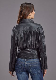 Rev up your style with the Stetson Women's Smooth Leather Fringe Moto Style Jacket. This black leather jacket features an edgy asymmetrical front zip closure, oversized notch collar, and a wide waist band for a bold and daring look. The angled zip pockets and vertical back sleeve zippers add an extra touch of adventure while the long fringe adds a touch of rebelliousness. Ready to take on anything! Material: Leather Black Leather Jacket With Fringe For Spring, Edgy Leather Jacket With Fringe For Winter, Edgy Fringe Leather Jacket For Winter, Edgy Fringed Winter Outerwear, Spring Fringe Biker Jacket, Edgy Winter Outerwear With Fringe, Edgy Fringe Winter Outerwear, Fall Biker Leather Jacket With Fringe, Winter Biker Outerwear With Fringe