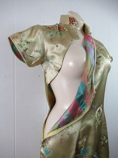 "Vintage 1960s Asian design dress. Made of pale yellow green shimmery silk. Has nerd collar and side zipper. No label. Size medium. Actual measurements are: 36\" around the bust 29.75\" around the waist 38\" around the hips 14.5\" shoulder seam to shoulder seam 44\" overall length In good condition with faint color fade from storage on front." Japanese Silk Dress, Green Vintage Dress For Evening, Vintage Long Green Dress, Fitted Green Vintage Dress For Spring, Green Lined Vintage Dress, Long Vintage Silk Dress, Creole Clothes, Vintage Asian Fashion, Asian Clothing