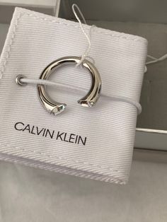 Calvin Klein Brilliant This Calvin Klein ring is very gorgeous on the fingers.    The clear stone makes it stand out. Calvin Klein embossed on the ring. Open ended ring.  Comes with box and pouch. Calvin Klein Accessories, Calvin Klein Ring, Womens Christmas Gift, Versace Wallpaper, Calvin Klein Jewelry, Calvin Klein Outfits, Calvin Klien, Calvin Klein Bags, Best Friend Quotes For Guys