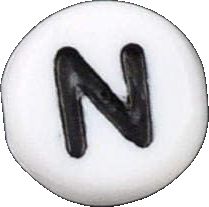 the letter n is made up of white and black buttons with black letters on them