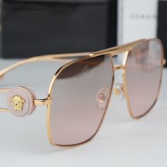 Brand New Versace Ve2269 10027e Gold Light Pink Mirror Gradient Silver Pilot Unisex Sunglasses Ve 2269 Same/Next Day Free Shipping! No Offers Accepted. Final Price! Don't Miss Out, Shop Now! 100% Authentic & Brand New! Brand: Versace Model Number: Ve2269 / Ve 2269 Color Code: 10027e Gender: Unisex Frame Color: Gold Frame Shape: Pilot Frame Material: Metal Frame Style: Full Rim Lens Color: Light Pink Mirror Gradient Silver Lens Material: Polyamide Bio 100% Uv Protection: Category 3 Size: 62x13x13 Luxury Rose Gold Sunglasses With Uv Protection, Luxury Pink Sunglasses For Summer, Luxury Pink Sunglasses With Gradient Lenses, Pink Luxury Sunglasses With Gradient Lenses, Luxury Pink Sunglasses With Uv Protection, Versace Gold, Versace Brand, Pink Mirror, Versace Accessories