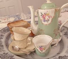 a tea set is sitting on a table