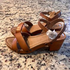 Never Worn, Size 10, Leather Platform Clog Sandal. Brand Mia Beach Clogs With Open Heel And Synthetic Material, Beach Sandals With Wooden Heel And Closed Toe, Brown Casual Clogs For Vacation, Casual Brown Clogs For Vacation, Beach Mules With Heel Strap And Round Toe, Brown High Heel Mules For Vacation, Brown Open Heel Mules For Beach, Beach Wedge Heel Clogs With Heel Loop, Brown Open Heel Mules For The Beach