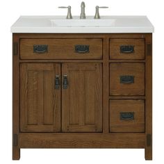 a bathroom vanity with drawers and a white counter top on an isolated white background for use as a sink