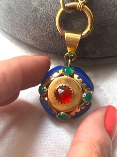 This is a beautiful Italian Vintage 14k Gold, Carnelian, Chalcedony & Green Agate Pendant. The colors are stunning and it looks beautiful on a simple or long chain. The pendant measures 1 inch (1.5 including the bail).  Necklace Weight: 12.9 grams Excellent vintage conditions. Thank you for visiting Boudoir Vintage!   Please feel free to contact me for further information or photos.  I offer international shipping. Your item will be packed with extreme care and will be shipped within 3-5 working Yellow Gold Chalcedony Gemstone Necklace, Yellow Gold Chalcedony Jewelry Gift, Yellow Gold Chalcedony Necklace As Gift, Formal Yellow Gold Chalcedony Jewelry, Red Chalcedony Round Jewelry, Elegant Yellow Gold Chalcedony Necklaces, Elegant Carnelian Natural Stone Jewelry, Elegant Carnelian Jewelry With Natural Stones, Luxury Gold Carnelian Jewelry