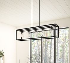 This 5 light rectangular chandelier is unique and perfect decoration for the modern or farmhouse home, minimal lines and modern tones give the light an edge that never disappoints. The corners of its simple cage frame are accented by square blocks, all finished in a deep earth black with clear glass. Perfectly for kitchen island, dining room, living room, cafe, bar, club, warehouse, hallway. Aiwen 5-Light Black Farmhouse Chandelier | US-DK-CIC-B5 Black Iron Light Fixtures, Dining Room Light Fixtures Rectangle, Dining Room Black Light Fixtures, Modern Farmhouse Dining Room Chandelier, Frame Kitchen Island, Townhouse Upgrades, Rectangle Light Fixture, Farmhouse Dining Room Chandelier, Dinning Room Light Fixture